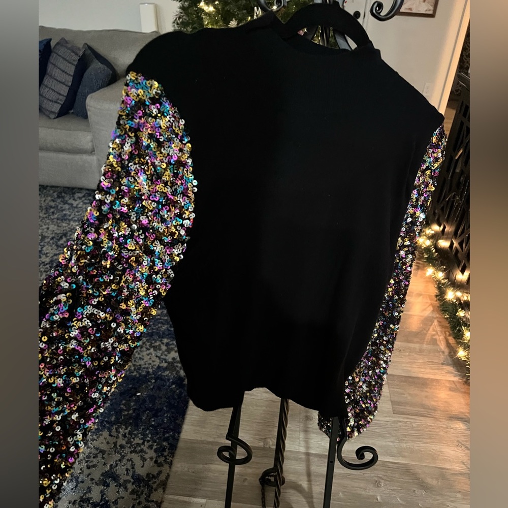 Sequin bell sleeve mock neck sweater
